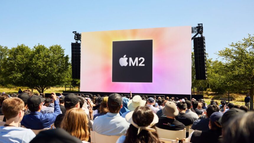 WWDC M2 logo on stage on a big screen